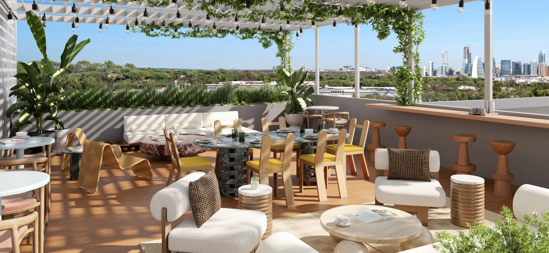 Rooftop lounge with skyline views and guests relaxing at The Code, Zilker.