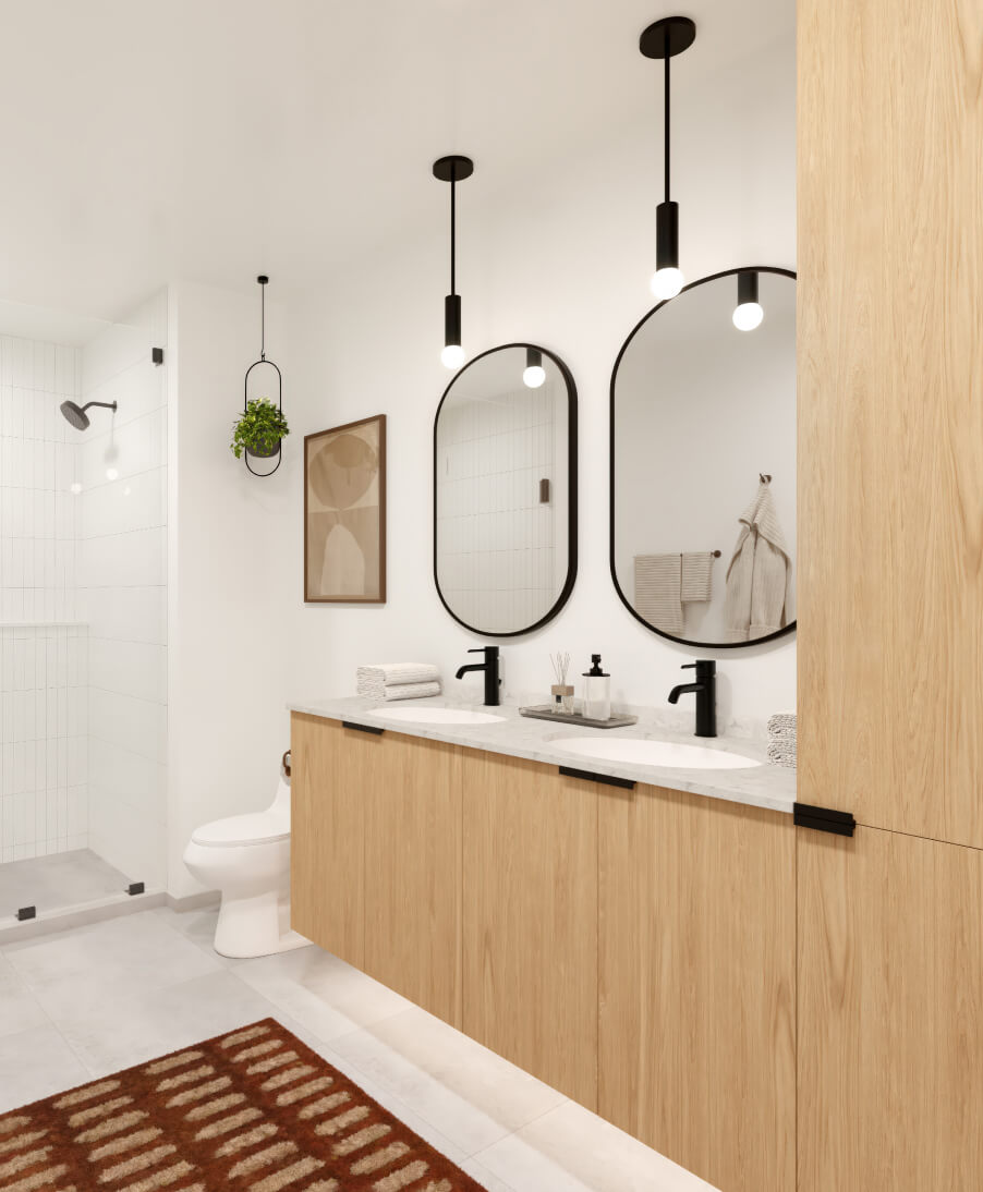Bathroom at The Code Austin in the Skylark palette with quartz countertops, light tile in the shower, and large light tile flooring.